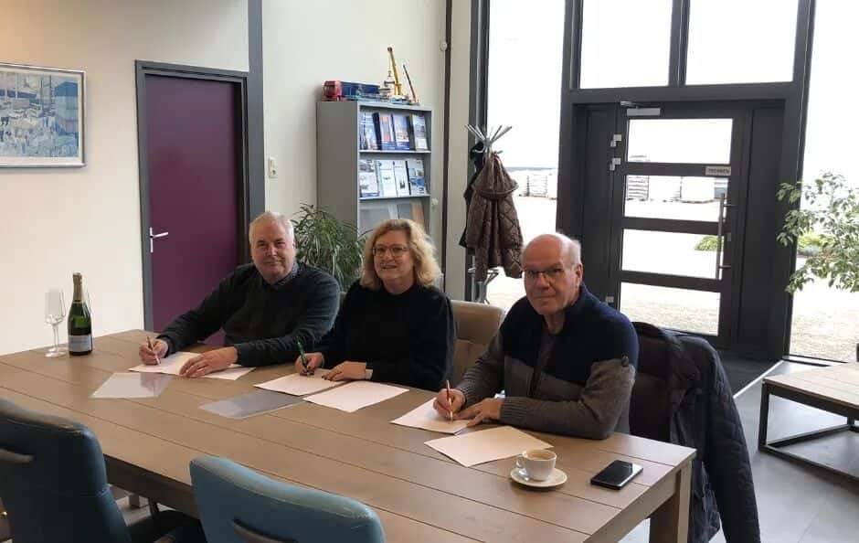three people at a table